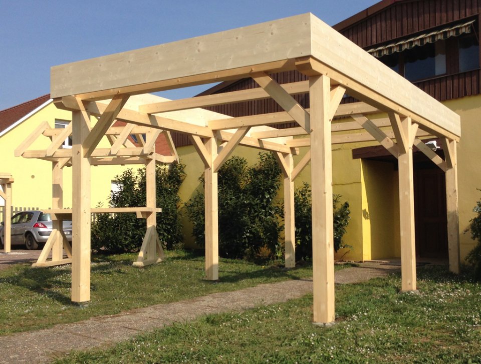 Abri de jardin en bois pour voiture

