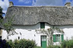 Thatched cottage traduction
