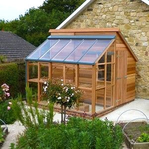 Cabane de jardin avec serre
