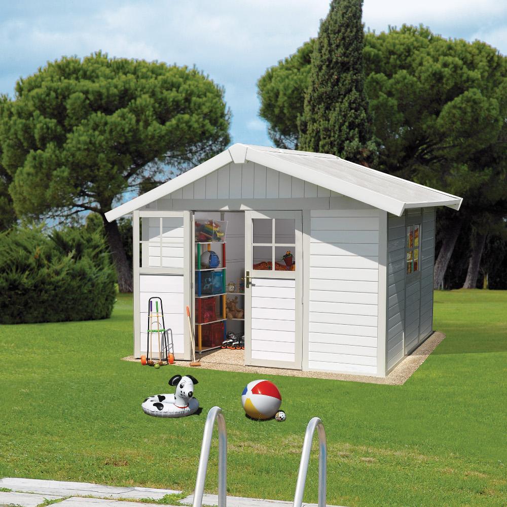 Cabane de jardin grise et blanche
