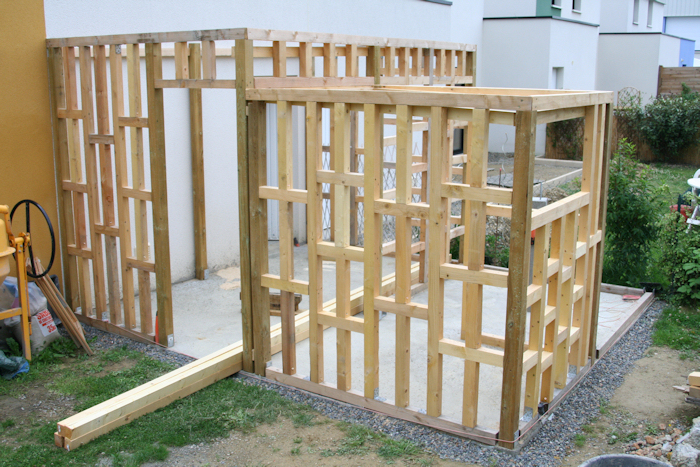 Abri jardin ossature bois toit plat
