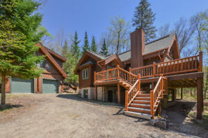 Chalet bois rond a vendre laurentides