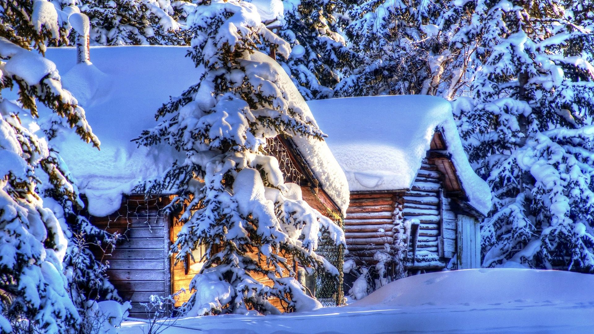Chalet sous la neige fond d'écran