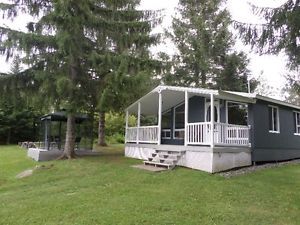 Chalet roulotte à vendre