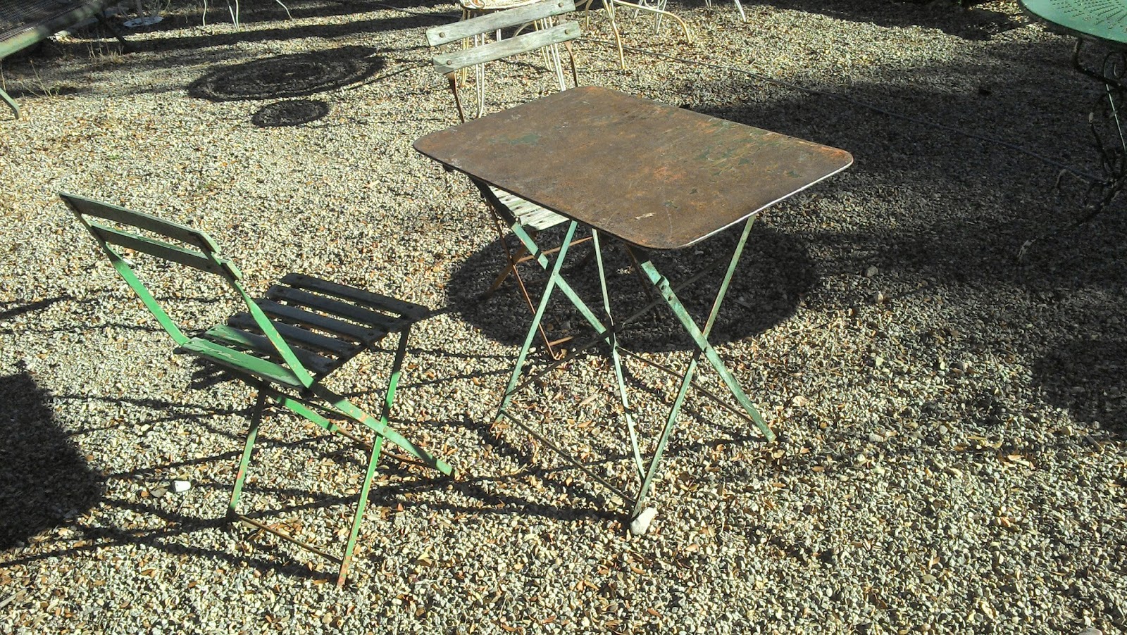 Salon de jardin en fer forgé pliant