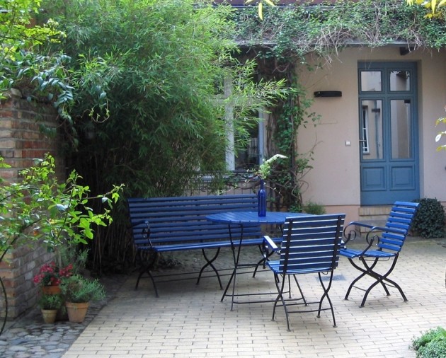 Peindre salon de jardin bois exotique